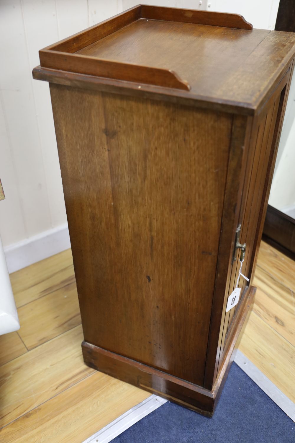 A late Victorian Aesthetic movement walnut bedside cabinet, width 39cm depth 36cm height 76cm